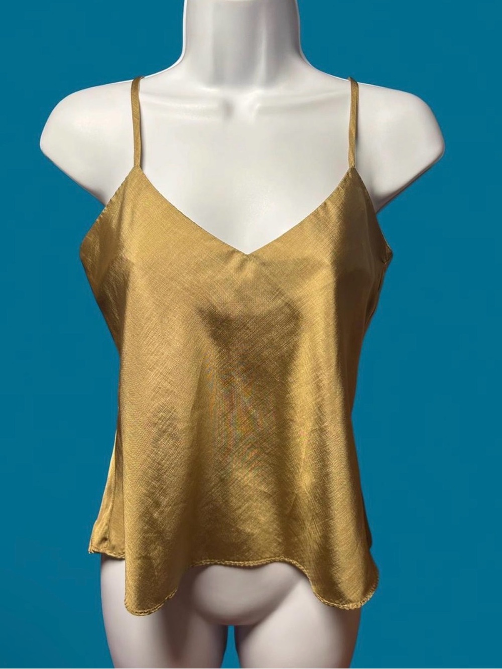 Vintage 1970’s classic V-neck camisole top in a warm gold color.